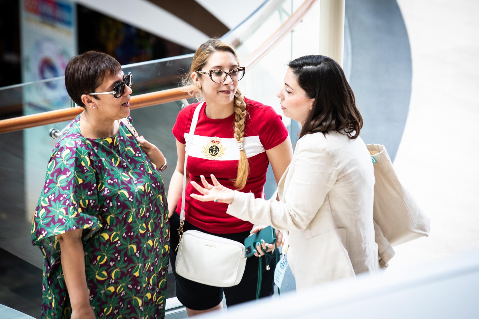 Attendees chat at the Rotary International Convention in Singapore. 27 May 2024.